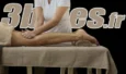 Massage des muscles de la jambe d'une personne allongée sur une table de massage.
